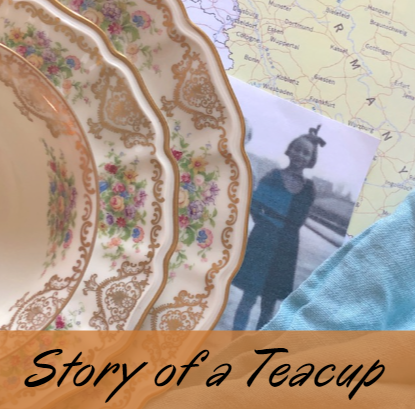 Story of a Teacup image. Three piece teacup and plate set with an image of a girl and a map in the background