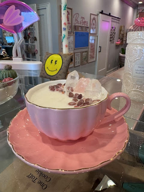 Candle with crystals in a tea cup at BesTea.